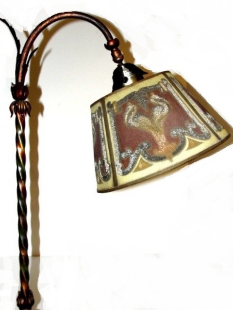 Moe Bridges Ornate Floor Lamp With Mesh Shade: Stamped Moe Bridges Milwaukee Wisconsin # 45101 on base. With ornate base below twisted column center post with metal flowers. Multi color painted accents in red, green and gold, with mesh shade. Tota