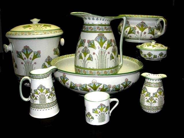 Rare Ridgeways England 8 Piece Chamber Set: Rare pattern and even rarer to find a set this large with Bow & Arrow Pottery mark query. Stamped Egyptian. Condition very good. Large Various size pieces.