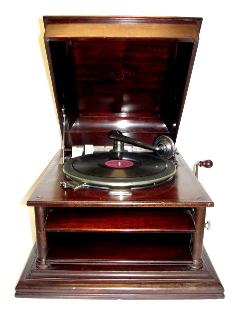 Mahogany Columbia Granfonola Victrola: Made between 1912 - 1925. The Columbia Grafonola "Favorite". Or Model 50 Equipped with a 12" turntable and triple-spring motor, its elegant "Perfected" tone arm with 2 inch reproducer No. 6, and its 1
