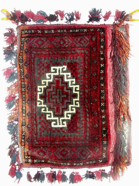Oriental Semi Antique Saddle Bag Rug C. 1930s: 21'' X 27''Condition very good. Persian Saddle Bag With Fringe And Tied Beads