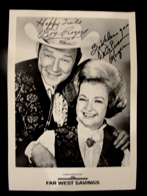 Signed Roy Rodgers & Dale Evans Photo: In Black & White unframed. Reads compliments of Far West savings on bottom. Condition good, with a couple slight indentations. Photo size 7'' x 5''