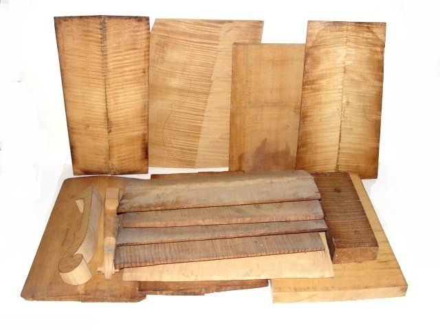 Lot Of Tiger Maple Violin Making Wood: Lot Of Tiger Maple Violin Making Wood, including 13 pieces of of cut wood for making violin back, plus 2 cut necks, Average size of wood 10' x 15''Condition good clean strong tiger striped wood.