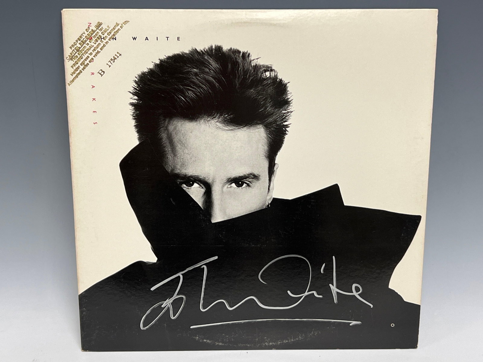 John Waite Autographed 1984 Promo Album No Brakes JSA: Original album signed on the cover. Gold stamping for promotional use only. Enormous silver signature by the former member of bands such as the Babys and Bad English and had many hits in his own right