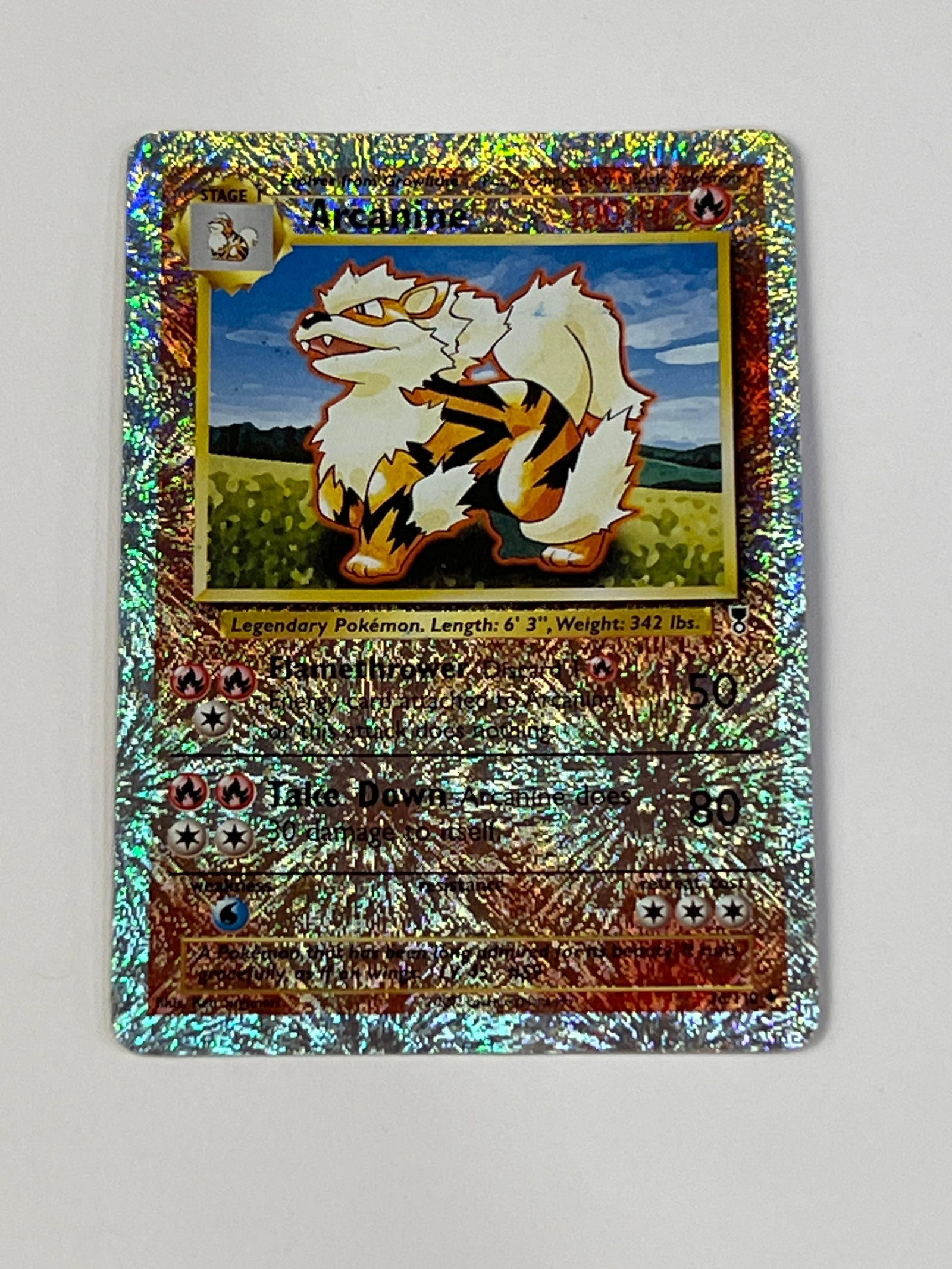 Pokemon Arcanine Legendary Collection Reverse Holo 36/110: Authentic Stage 1 Pokemon card from 2002. Amazing looking front of the card, but there is a stain on the back of the card.