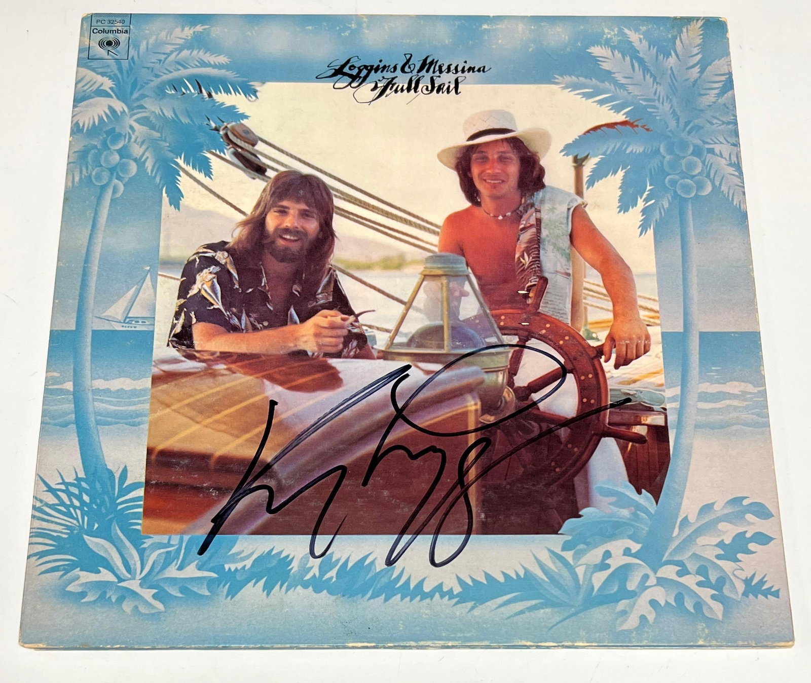 Kenny Loggins Autographed Full Sail Album Cover JSA: Vintage 1970's album by Kenny Loggins and Jim Messina signed in black marker by Loggins. HUGE signature by the popular musician best known for a few 1980's pop culture hits. JSA certified.