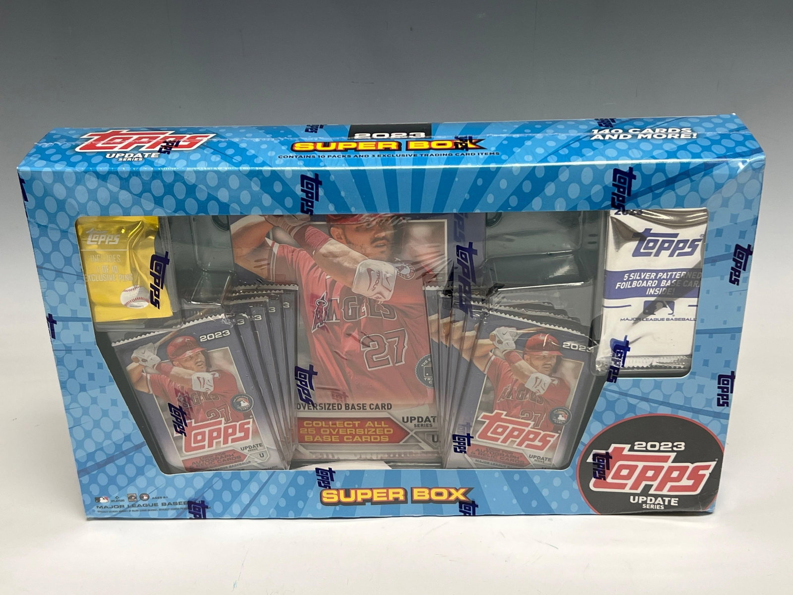 2023 Topps Baseball Unopened Super Box Mike Trout: A variety of packs from the update series, oversized card pack, pins and more. Over (140) cards. Some of the plastic is ripped, but box is unopened.
