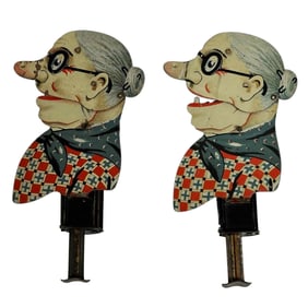 (2) German Tin Litho Mechanical Granny Sparklers