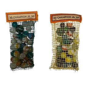 Two Packs of Champion Jr. Glass Marbles