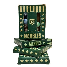 Four Green Boxed Marbles