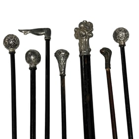 Seven (7) Carnival  / Circus Canes w/Cast Metal Toppers