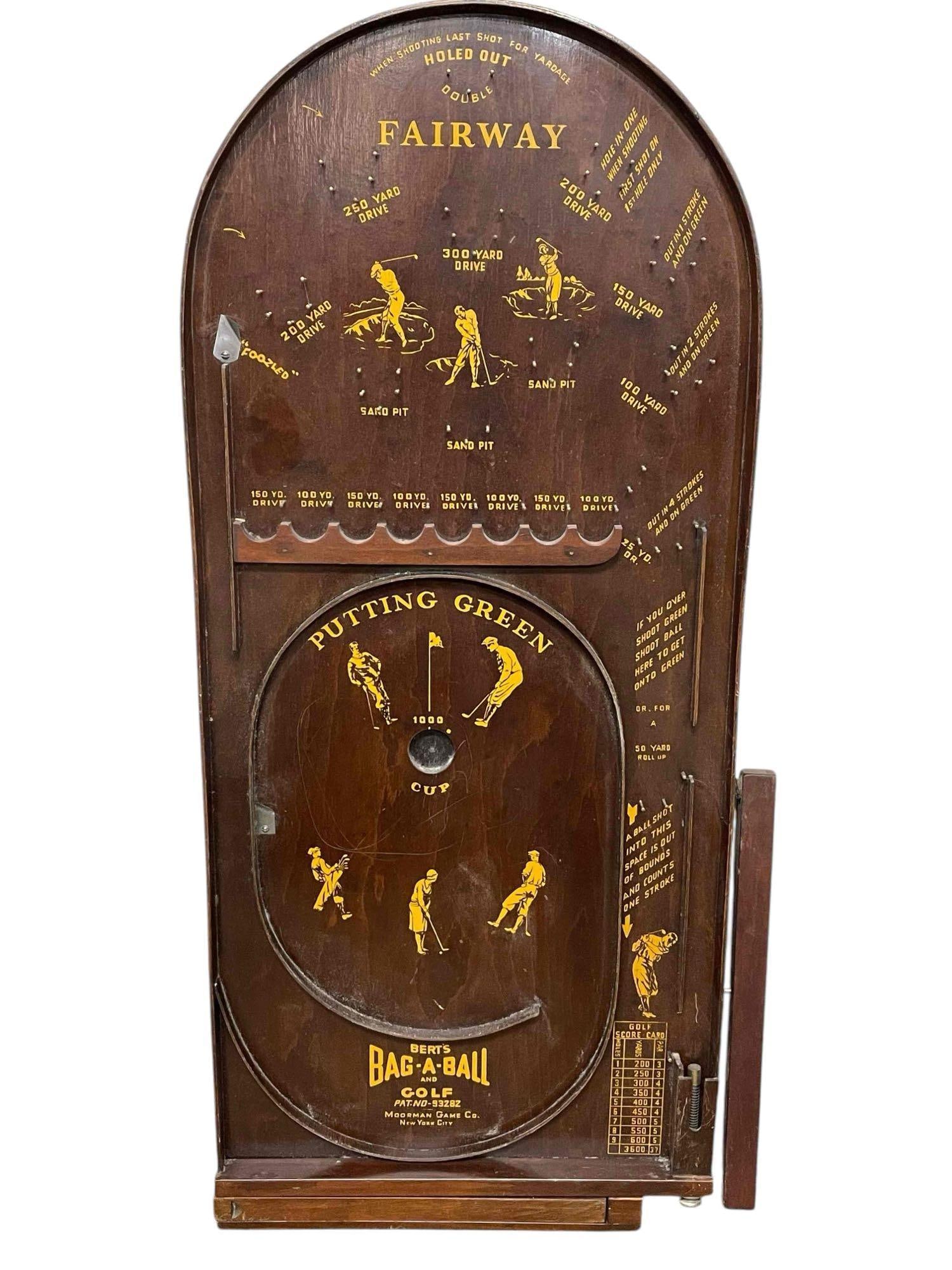 Bert's Bag-a-Ball & Golf By Moorman Game Co.: A bagatelle and golf style game by Moorman Game Co. This board is in good condition and has minimal wear from use and storage. Some light scratching on the game surface but not deep gouges. The frame 