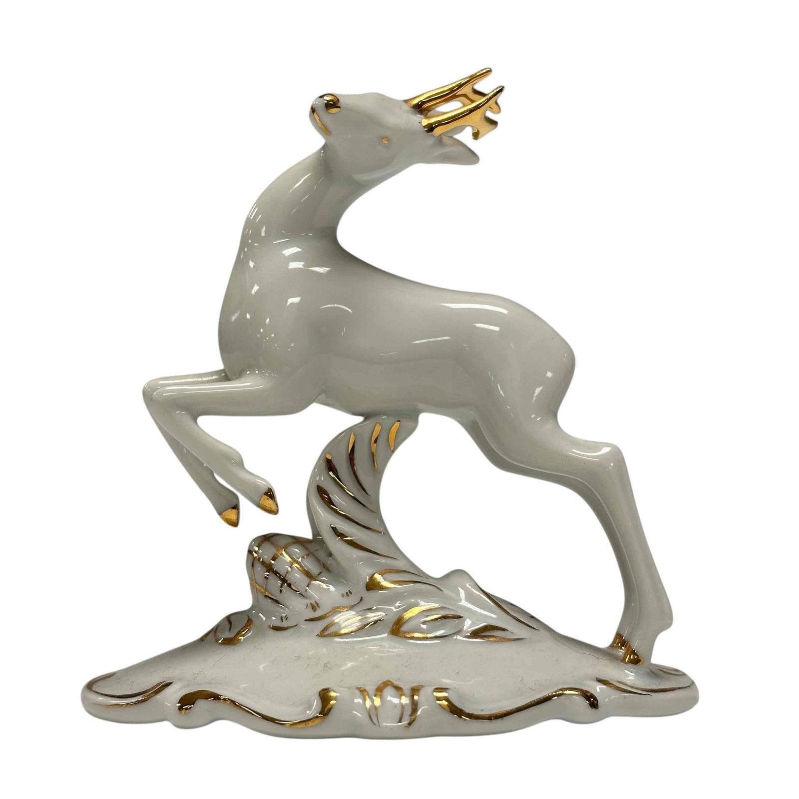 Royal Dux Porcelain Figurine: Royal Dux porcelain deer with white glaze with gold accents. Measuring approx 5" tall x 4.5" wide. Good condition as shown, see photos