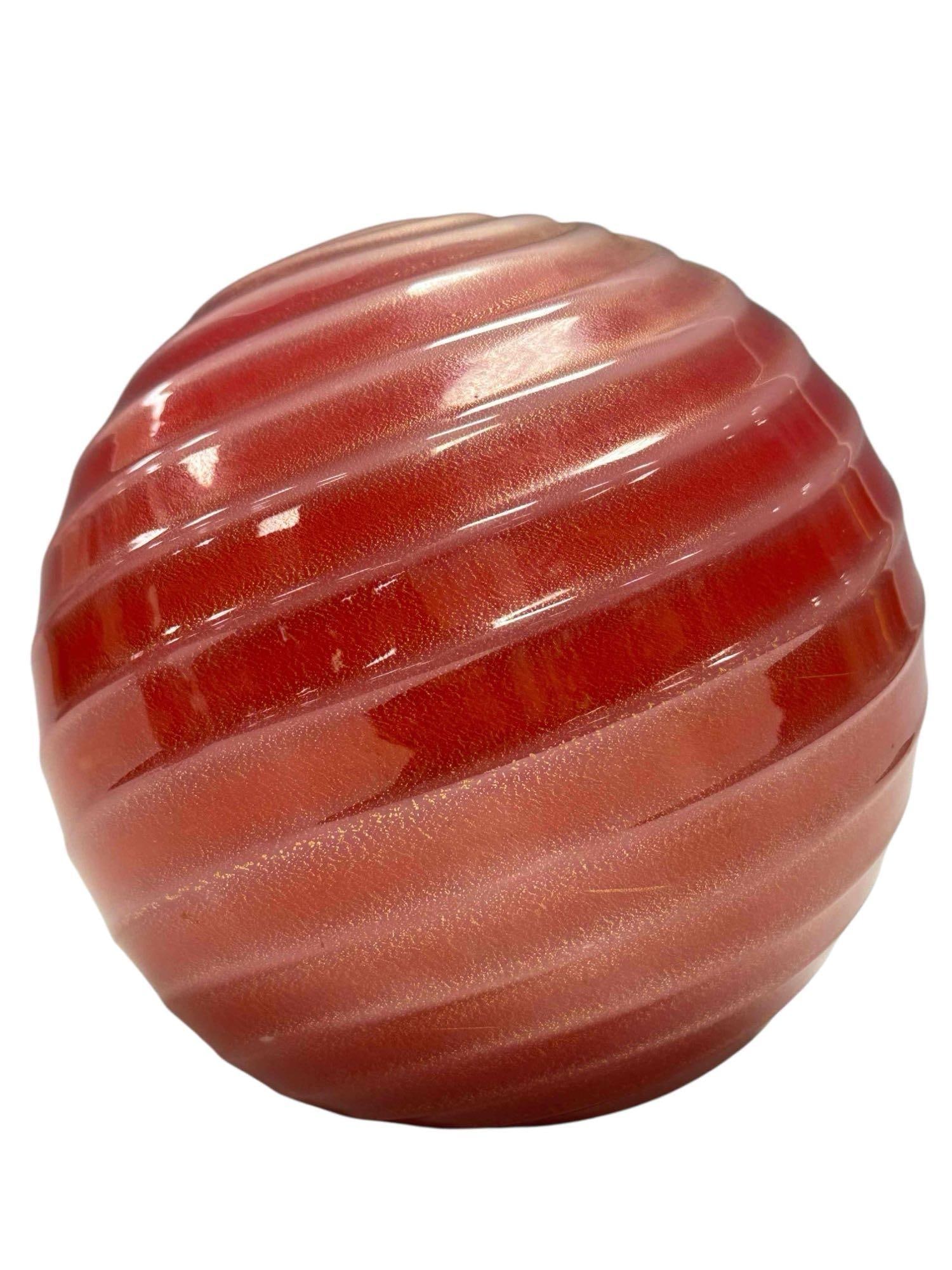 Venetian Hand Blown Art Glass Ball Vase: A spherical swirl form ball vase with gold speckle and white opal top cascading to red hues as shown. Measuring approx 6" h x 7" diameter. Good condition as shown, see photos