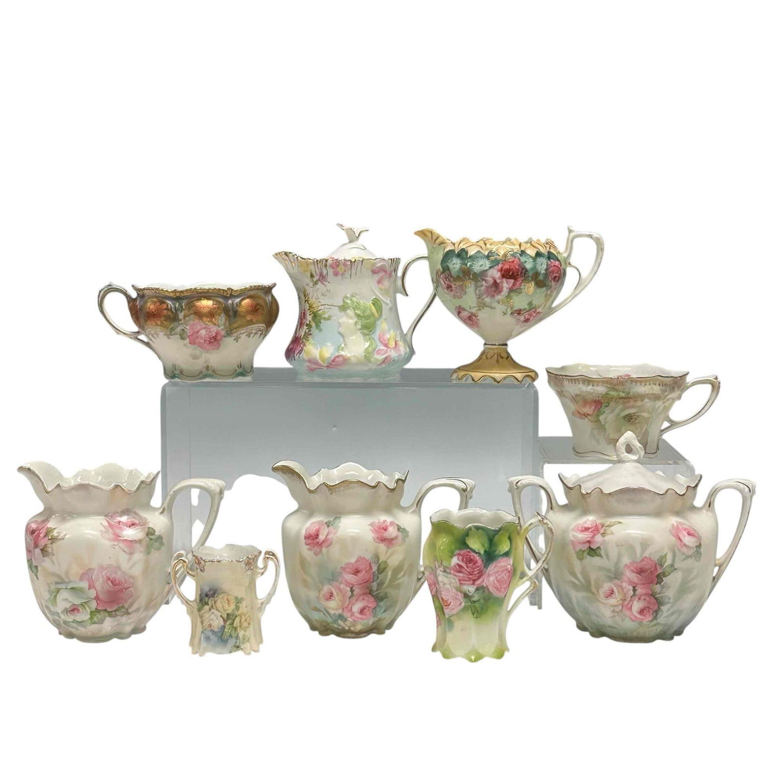 (9) RS Prussia: Various tea cups, creamer and sugars. Matching creamer and sugar, high relief with portrait and others. Good condition, light use and wear, no cracks, see photos. All marked as shown. R.S. Prussia ref