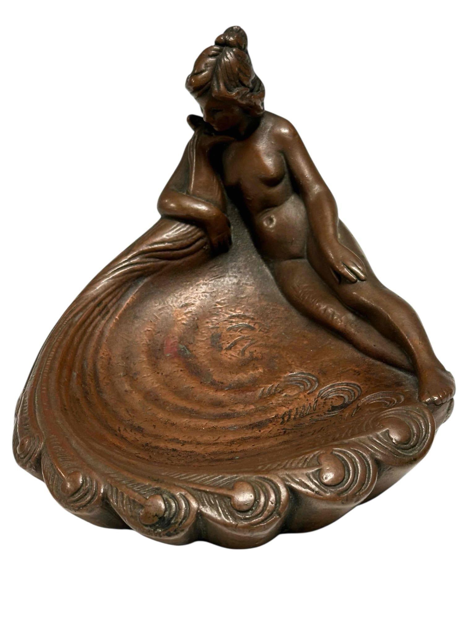 Art Nouveau Nude Female with Peacock Sculpture: A fine and elegant Art Nouveau - Art Deco reclining nude female tray with peacock. Clad bronze with two hallmarks on sculpted edge as shown. Measuring approx 6" h x 8" d. Light use and wear, overall v