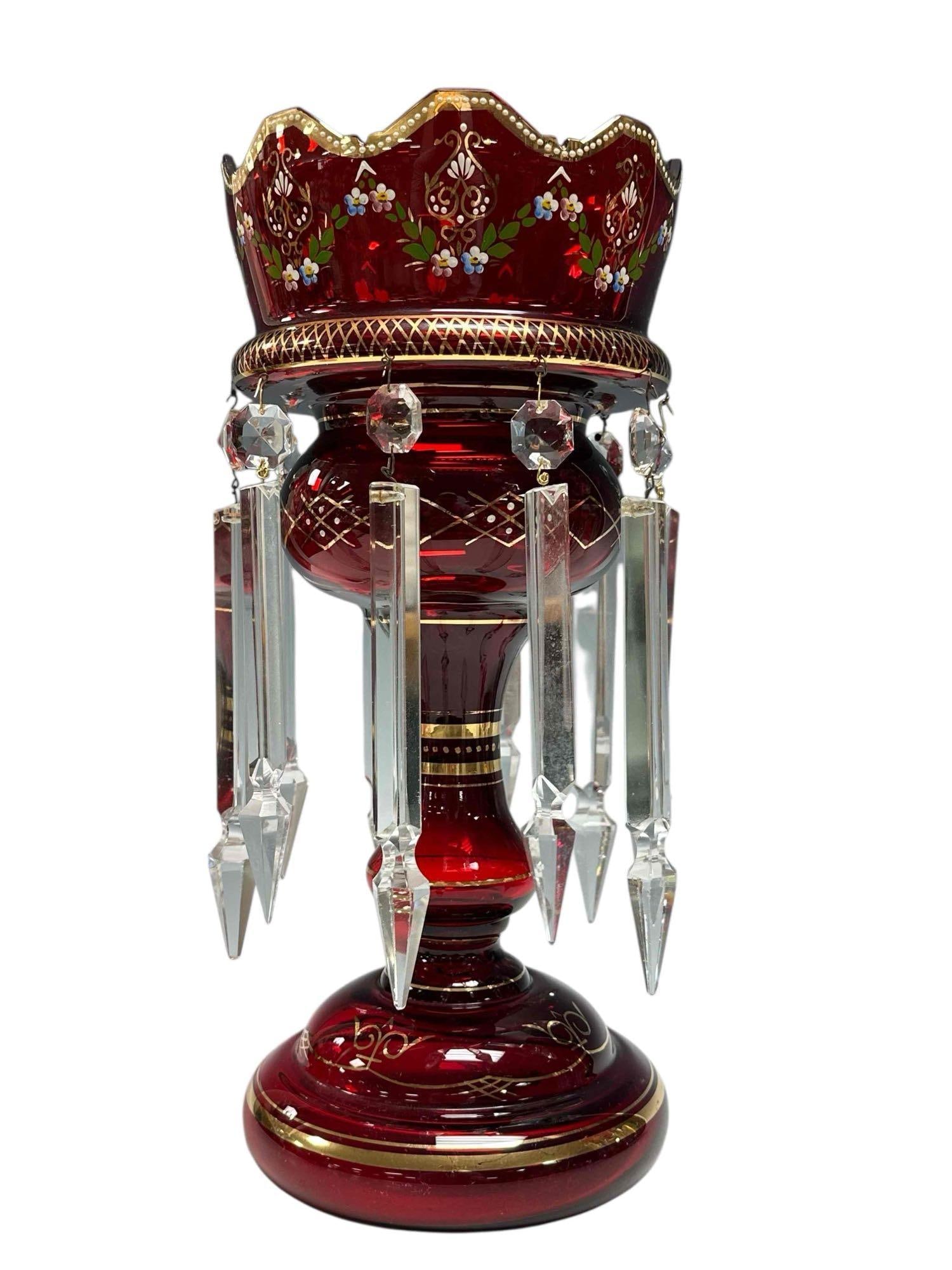 Czech Ruby Art Glass Luster with Long Drop Prisms: Bohemian ruby red colored art glass mantle luster with enamel and gold trim having long flat back spear point 9" prisms. Measuring approx 12.5" tall x 7" diameter. Light use and wear, overall good as
