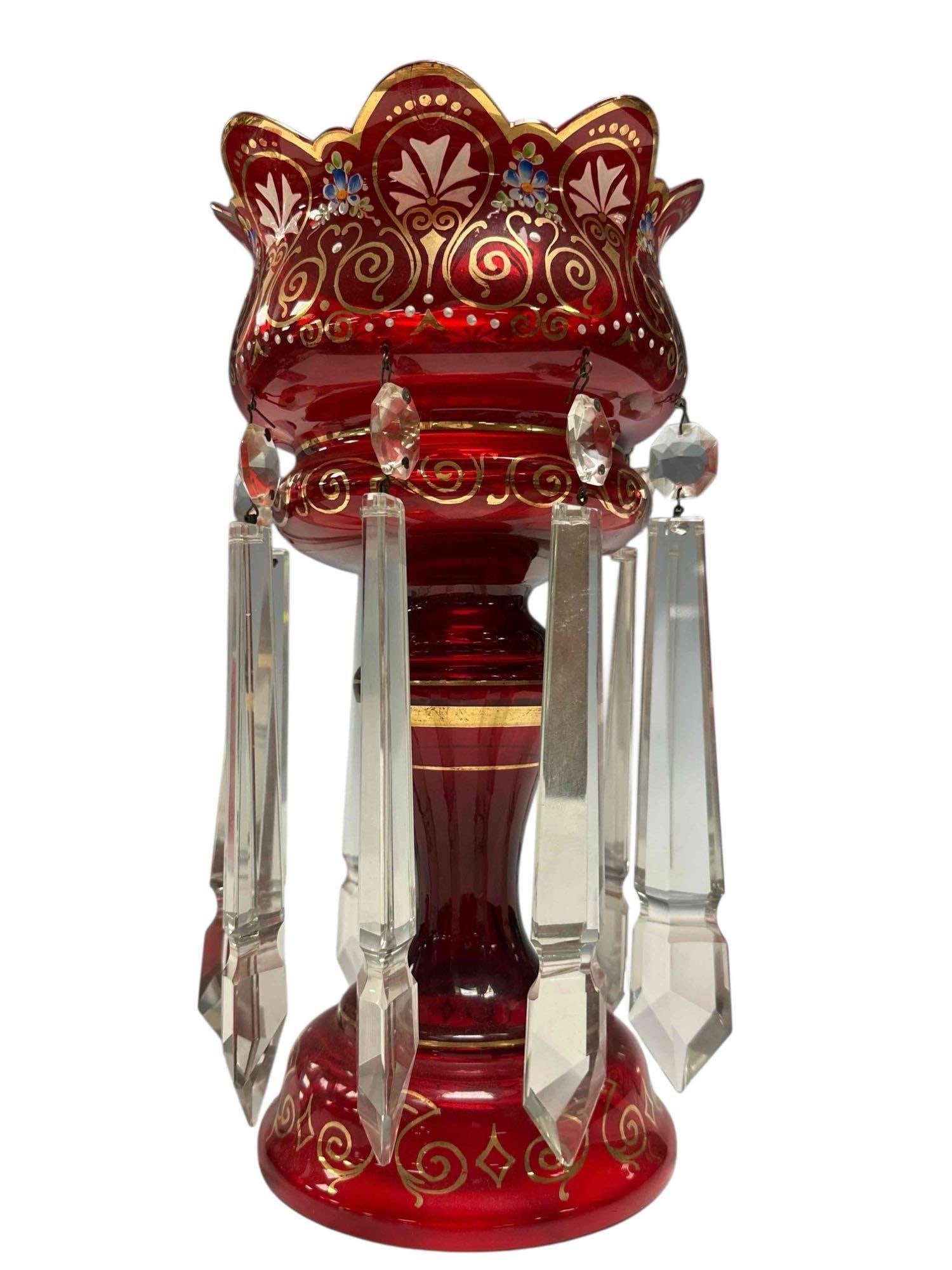 Czech Ruby Art Glass Luster with Long Drop Prisms: Bohemian ruby red colored art glass mantle luster with enamel and gold trim having massive long flat back spear point 9" prisms. Measuring approx 12.0" tall x 7" diameter. Light use and wear, overall