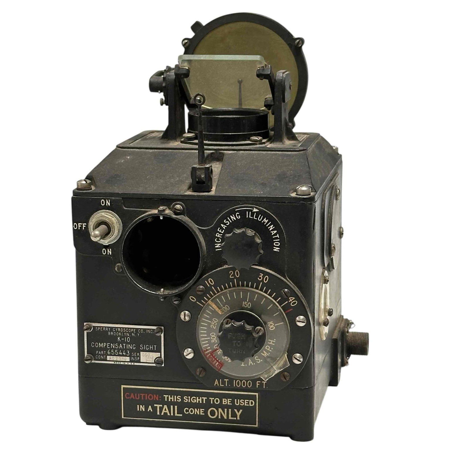 WWII USAAF AERIAL GUNNER K-10 COMPENSATING SIGHT: WWII USAAF Aerial Gunner K-10 Compensating Gun Sight. Maker marked by Sperry Gyroscope Co. Inc., Brooklyn, New York. Serial number 507 Measuring approx 7 1/2" x 5 1/4" x 8". Appears complete, not test