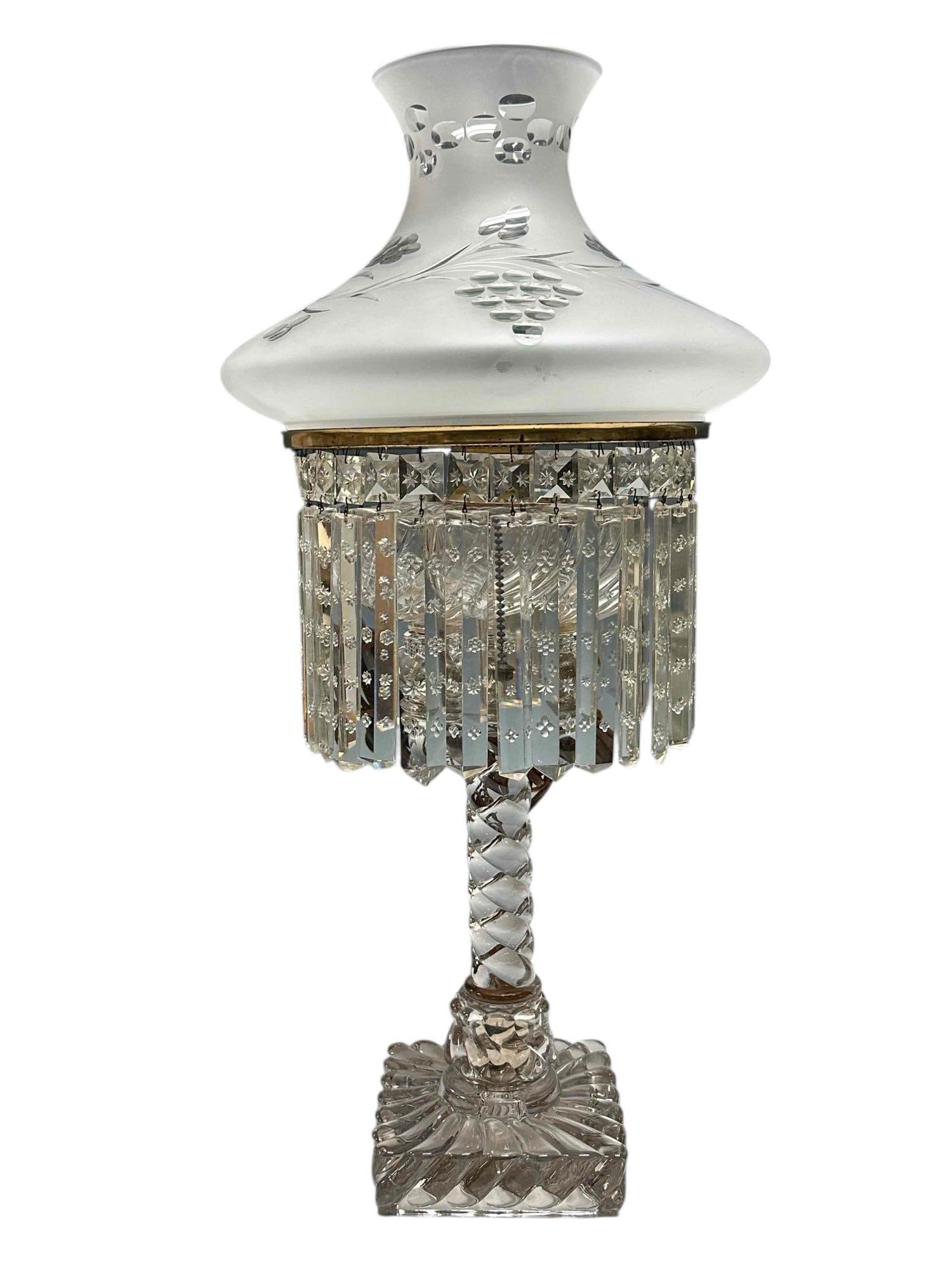 Baccarat Electrified Column Oil Lamp with Prisms: Frosted and etched 10" fitter sized shade seated on 27" tall baccarat swirl base with etched crystal 7.5" long prisms. Electrified and working as shown. See photos. Few nicks on prisms, overall very g