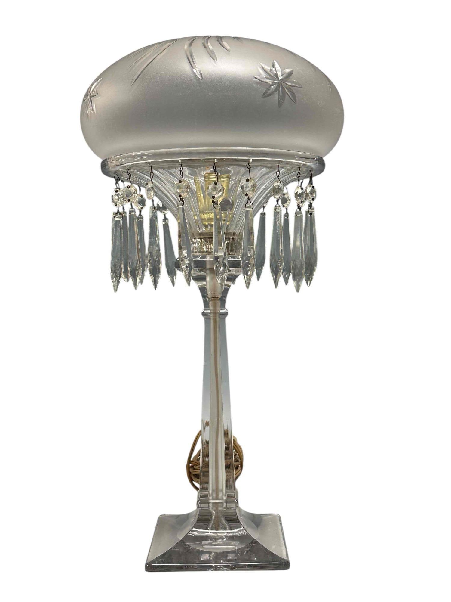 Heisey Aristocrat 8" Electro Lamp with Frosted Shade: A fine colourless Art Deco base with frosted 8" shade. Working as shown with tear drop double hung prisms. Measuring approx 20" h x 10" diameter, See photos