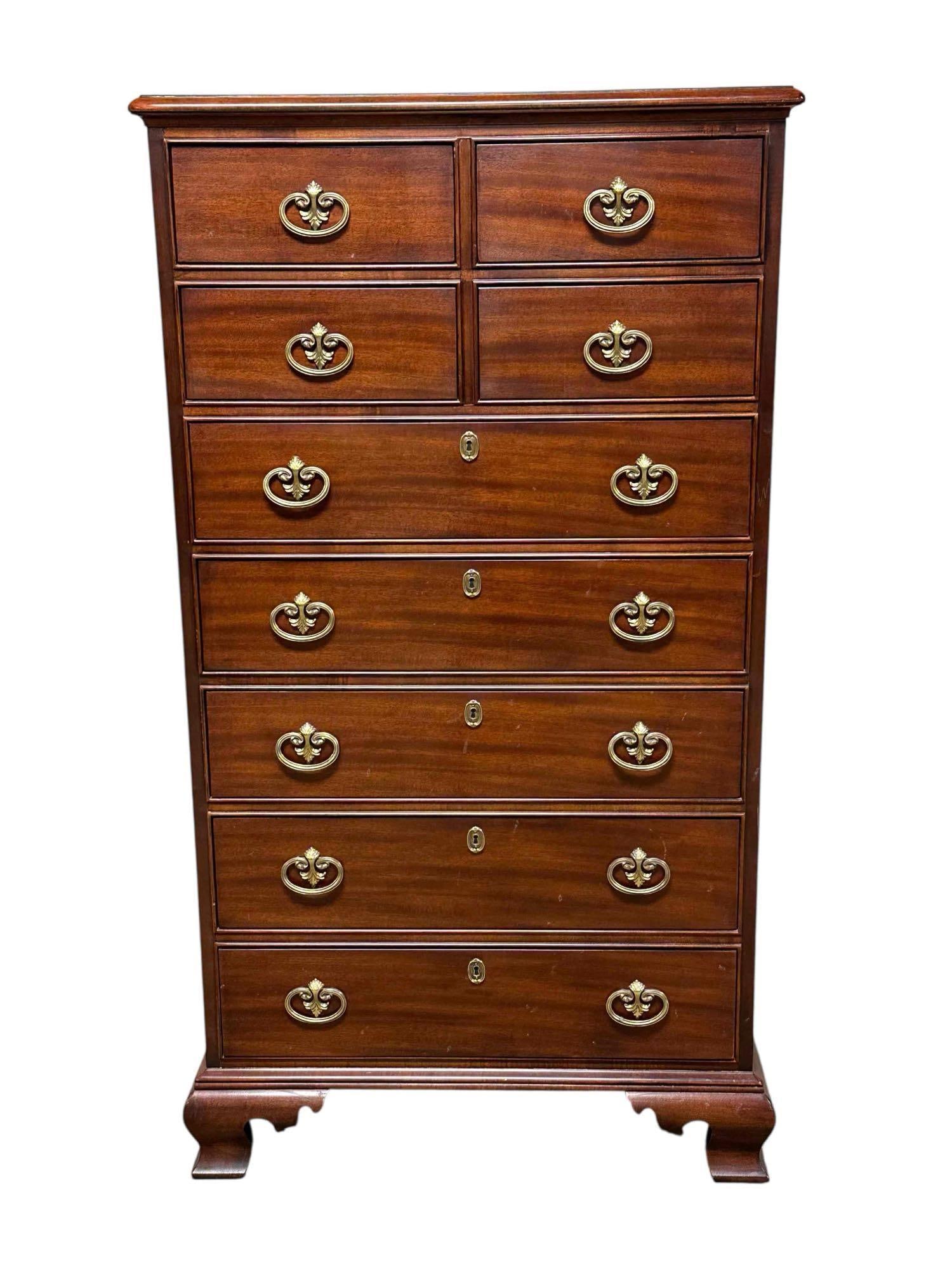 Henredon Mahogany Lingerie Tall Chest: A fine quality 20th century American mahogany tall chest on Empire feet. Measuring approx 57.5" h x 31.5" w x 19" d. Very good condition as shown, see photos