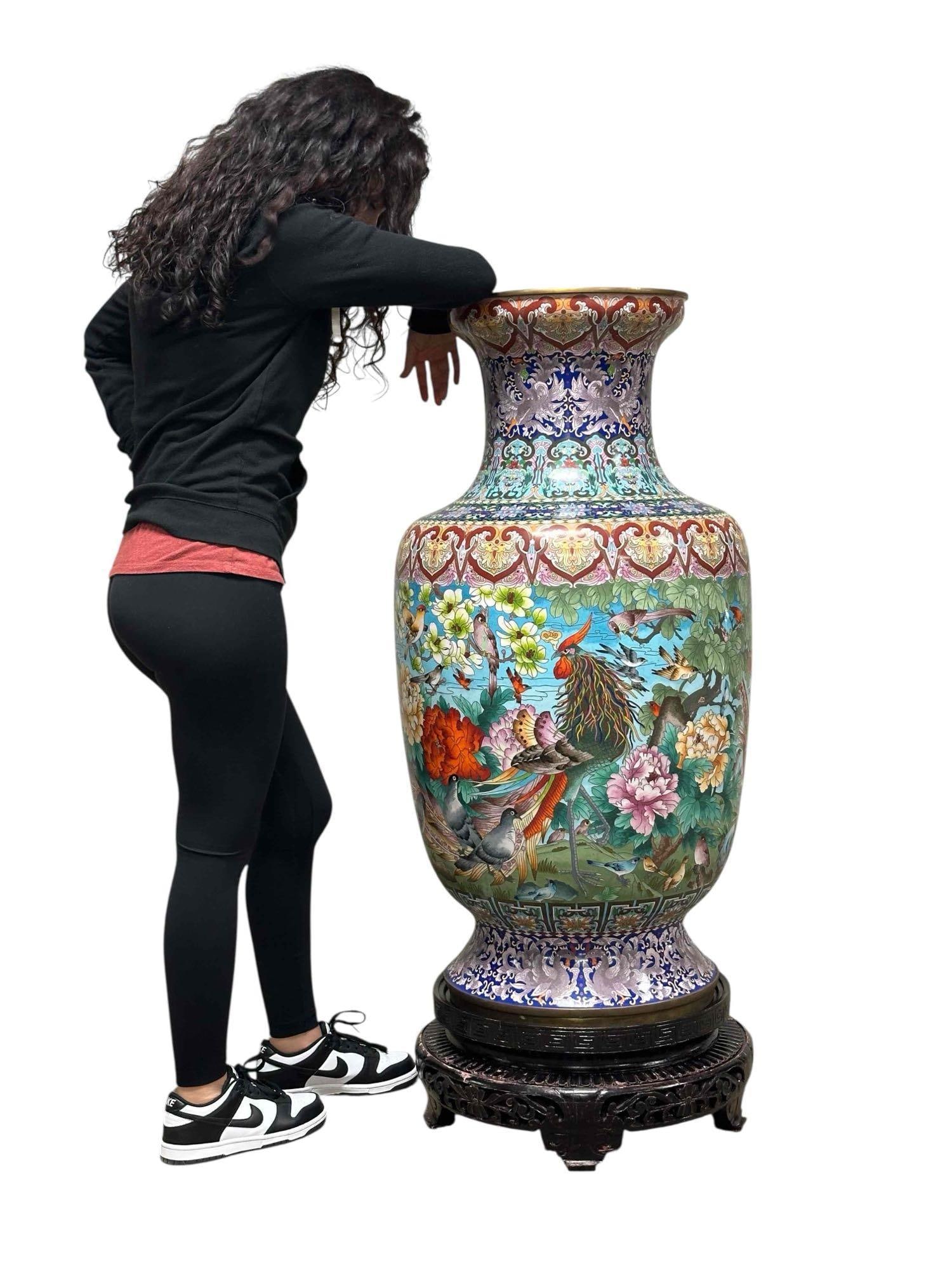 Monumental Chinese Cloisonne Temple Vase on Stand: Vase with stand measures approx. 47" H x 19" D. Top opening measures 14" D. Vase alone measures approx. 40" H