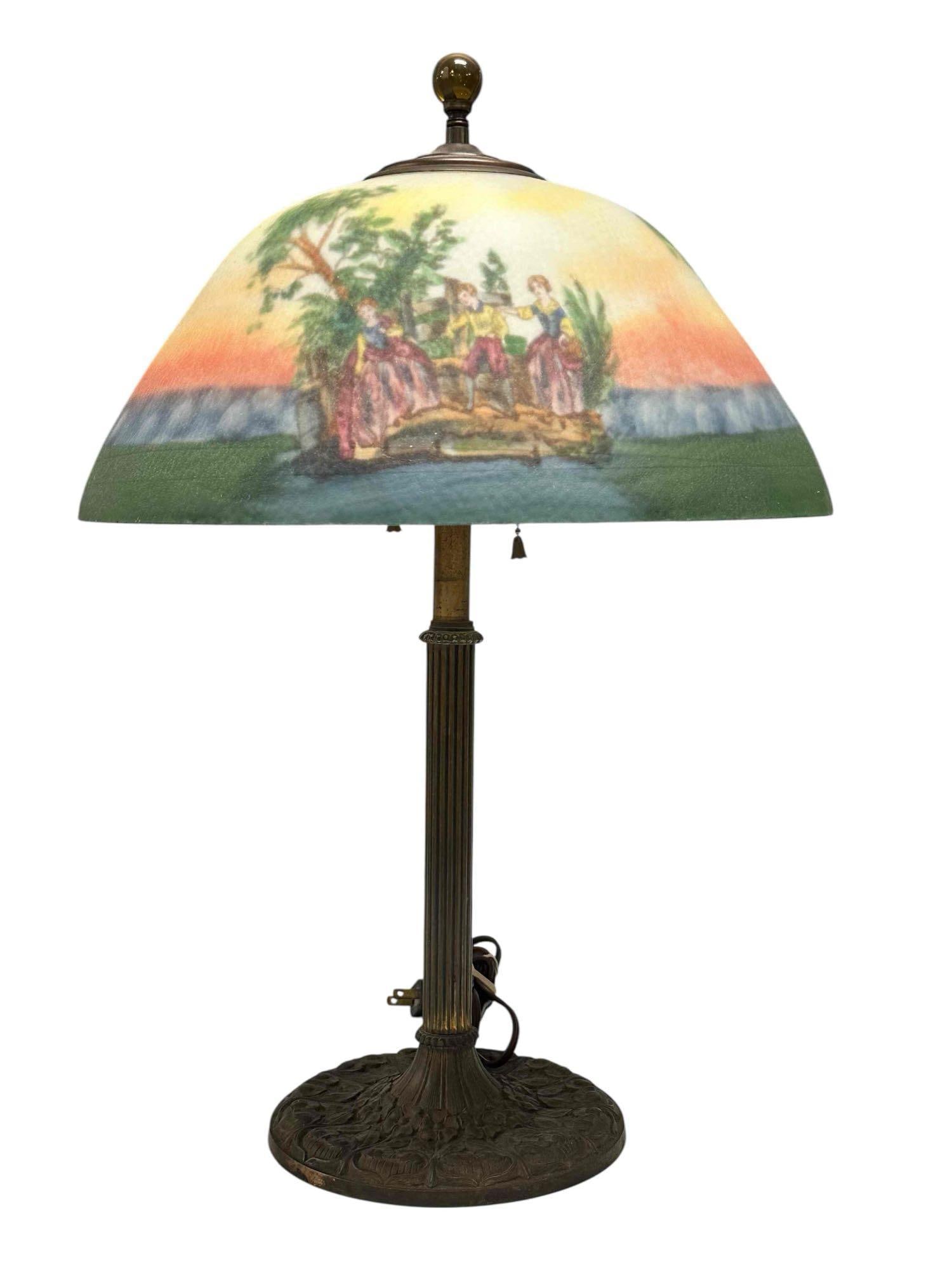Miller Art Nouveau Lamp with Reverse Painted Shade: American reverse painted courting scene shade on Art Nouveau E Miller lamp base in working good working condition, no issue, see photos. Shade measuring approx 7" h x 14.5" diameter and 22" overall to