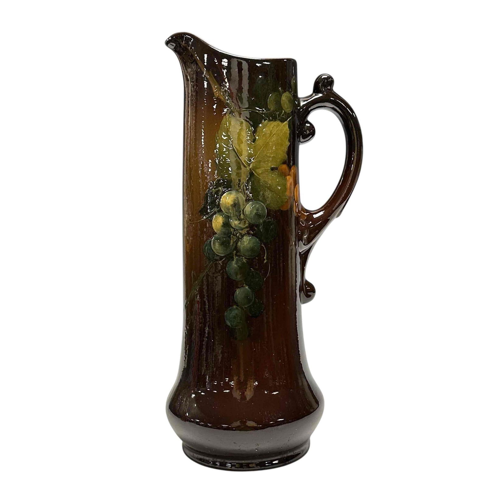 Roseville Rozane W. Myers Grape Tankard 16.5": Rozane Royal Dark tankard with grape decoration and signed by Walter Myers, whose name appears at the base below the handle. Impressed "Rozane Ware Royal" on the bottom. Measuring approx. 16.5" tall.