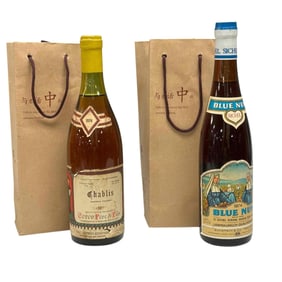 Two (2) Collector Wine Advertising Bottles