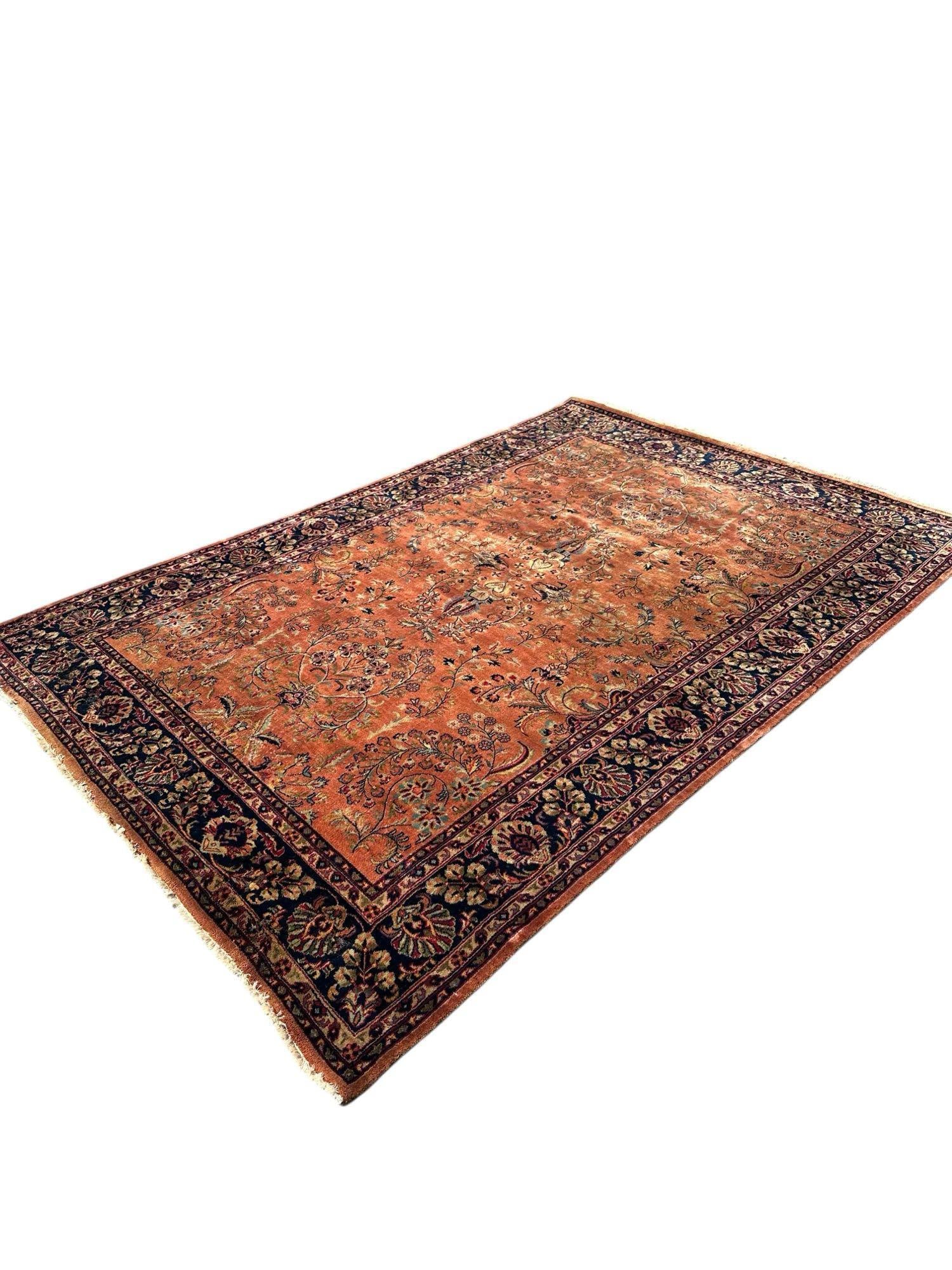 Antique Sarouk Carpet: Measuring approx 106" x 73". Light use and wear as shown, see photos. All recently cleaned