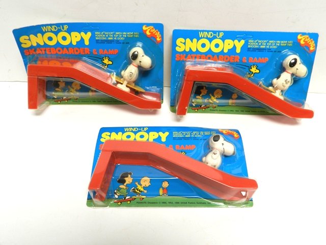 3 Aviva Snoopy Skateboard and Ramp Windups: Mint on cards. Circa 1970's.