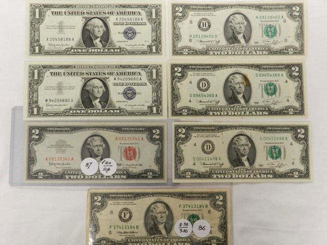 Collection of $1-$2 US Bills: Including a very nice red seal 1963 two dollar bill, 2 $1.00 1957 B Silver certs in very good condition 1995 and 3 1976 two dollar bill.
