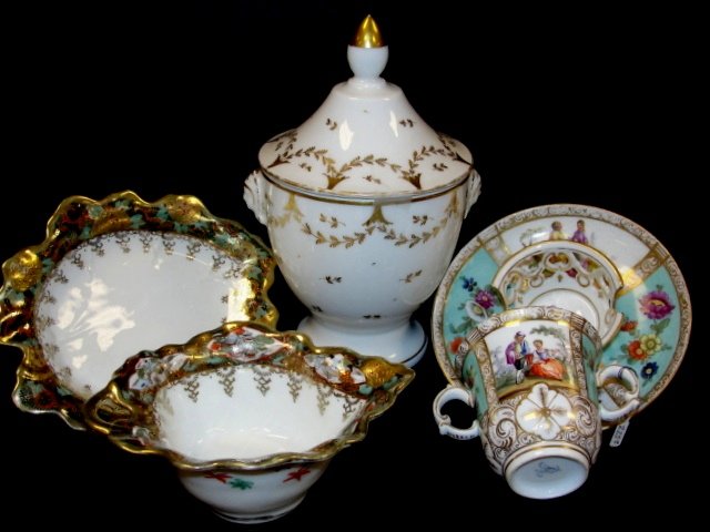 Porcelain Lot Including Dresden Cup & Saucer: Having hand painted scenes and rare saucer with cup holder sides, Nippon serving dish with under plate with lidded urn having faces on both sides. Condition all very good.
