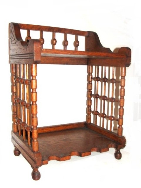 Oak Stick & Ball Table Top Shelf Ca. 1900: Having round feet, gallery with spoon carved sides and cut out bottom shelf. Condition very good, one foot reglued. '' Feet may not be original not positive''. 19'' X 13'' x 9 1/2''