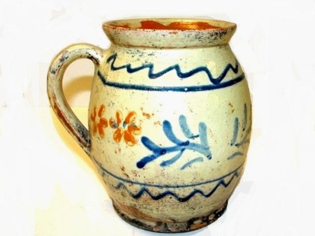 Late 19th. French Redware Decorated Pitcher: This beautiful country French water pitcher is from the Alsace Lorraine region of France and was made around 1880. The pitcher is hand-turned of Terra cotta / red-ware clay, glazed on the inside with