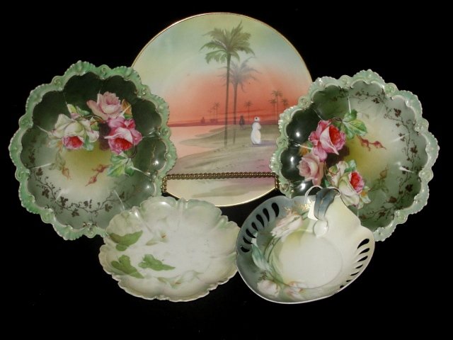 Nippon, RS Germany And Austria Porcelain Group: Nice collection all in good condition. Nippon plate with Arabian sunset 9" Dia. Two MZ Austria 8" plates with roses and scalloped edges,RS Germany handle serving dish with Lilies 2 1/4'' x 6 1/2'', un