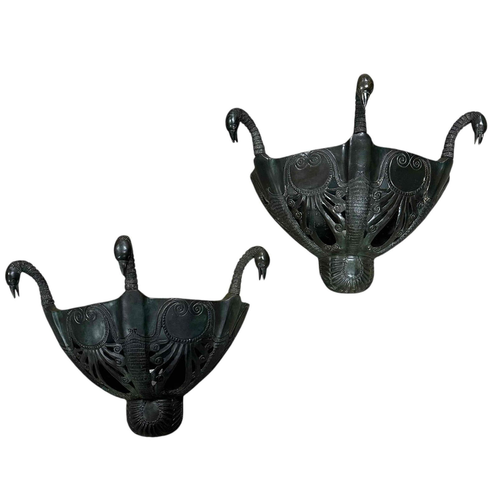 Pair of French Neoclassical 3 Swan Bronze Wall Sconces: pair of early 20th century Egyptian Revival bronze wall sconces. Both of the matching sconces feature with three swan bird heads decorating the top of the sconce and pierced framework. Single socket l