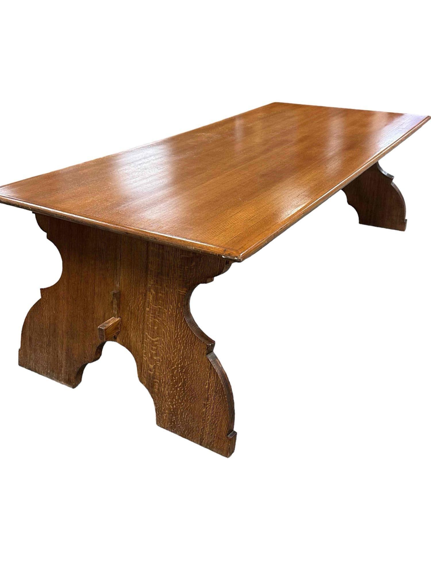 American Arts and Crafts Oak Harvest Table: An impressive 8ft oak arts and crafts harvest trestle farmhouse style dining table. Measuring approx 30in h x 42in w x 8ft long. Light use and wear consistent with age. Overall very good as shown, ear