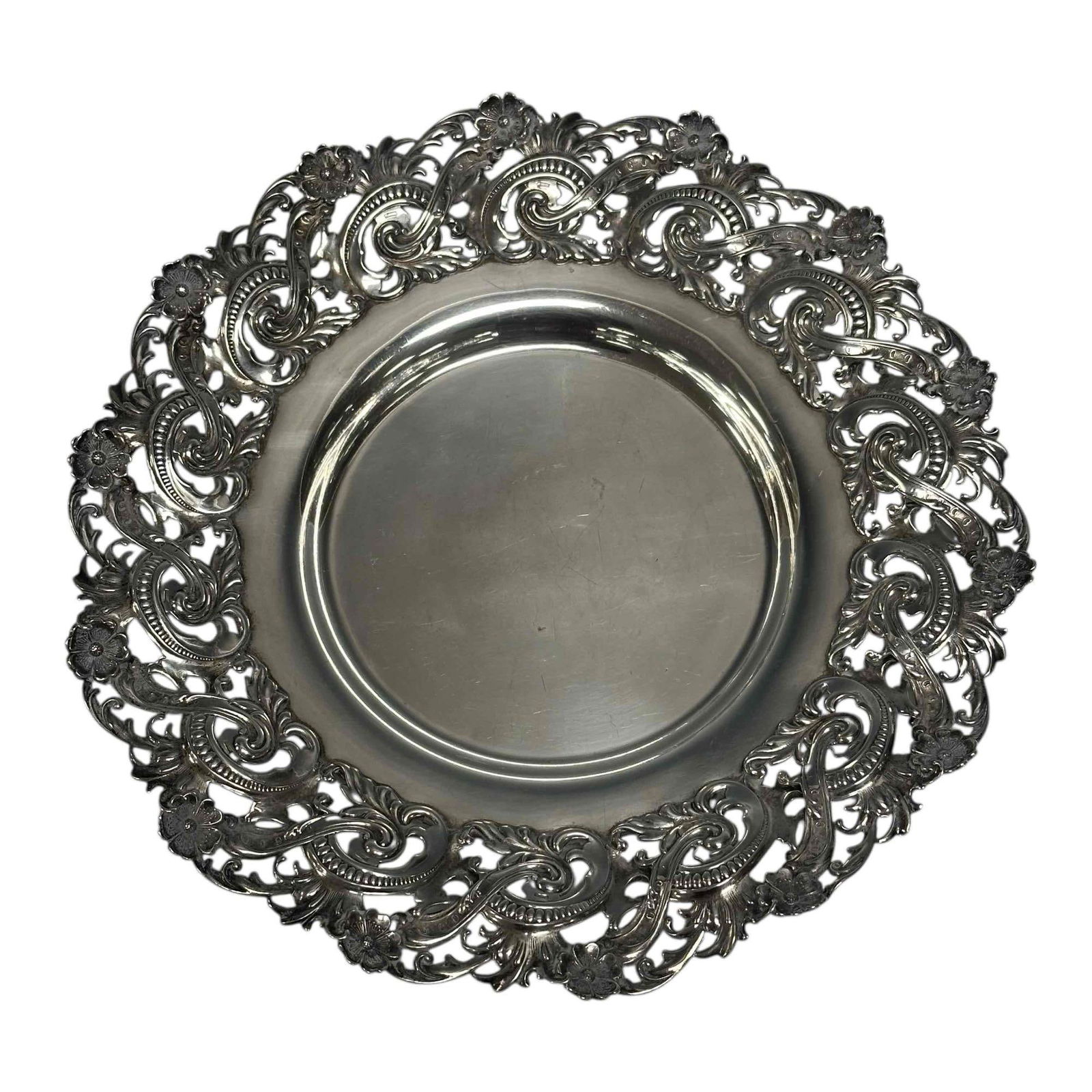 Howard & Co. New York Sterling Silver Tray: Art Nouveau Sterling Silver small tray / plate with floral and foliage border by Hoard and Co of New York numbered 1895. Measuring approx 9.25" diameter, light use and wear, overall very good as shown