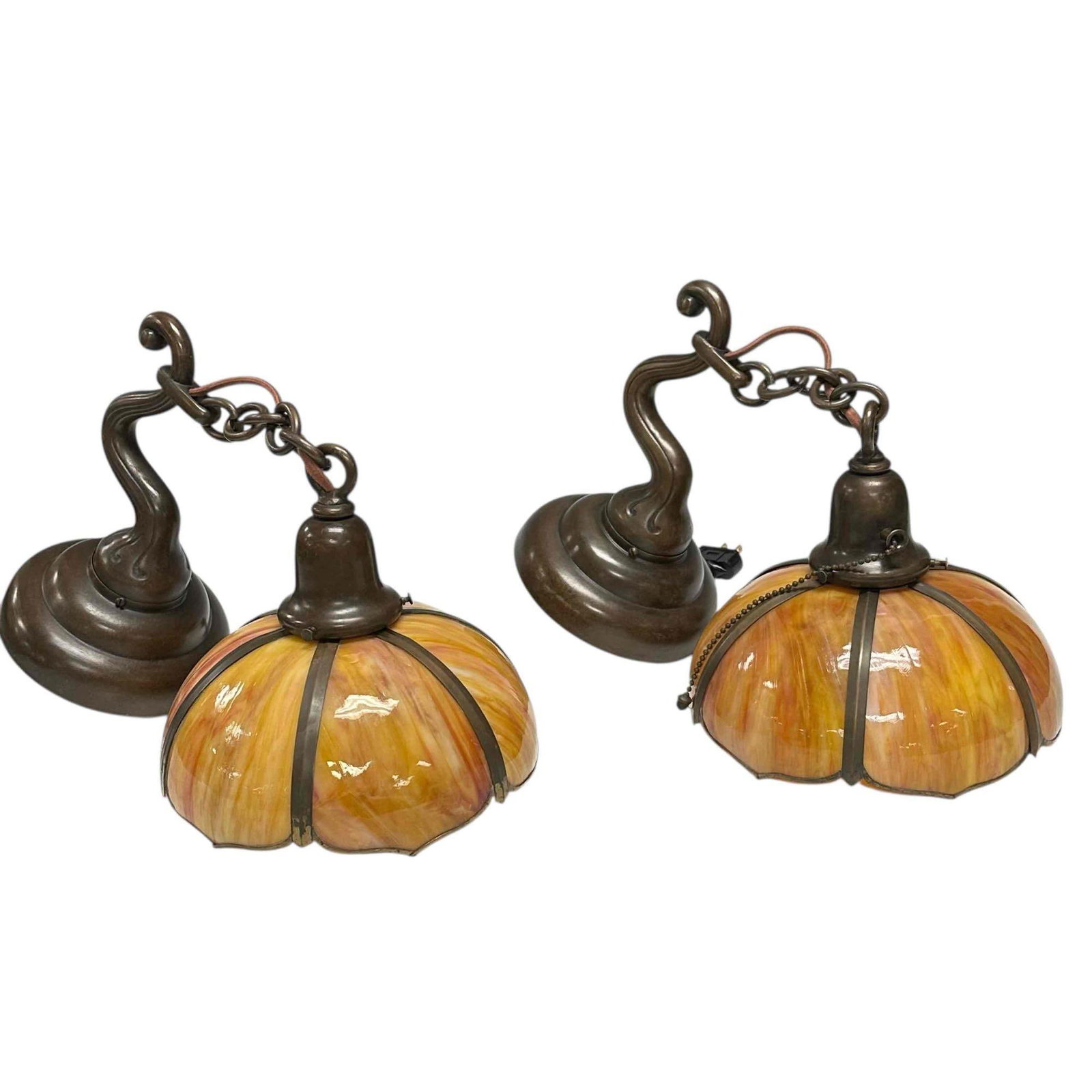 HANDEL - Signed Pair Of Hanging Sconces: Match pair of Arts and Crafts HANDEL bronzed wall sconces with hanging bent slag glass paneled shades with sunset color hues of gold, yellow and oranges. Both marked inside bell wall mount as shown. M