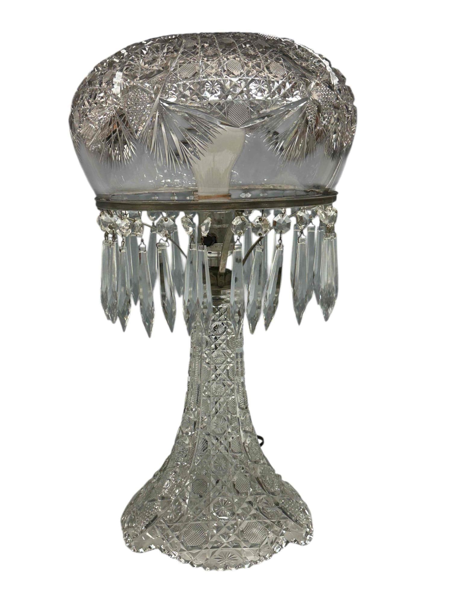 American Domed Mushroom Table Lamp: American 1910-1930 period glass mushroom dome shade table lamp with tear drop prisms. Diamond and Hob star pattern. glass stem, rim and accents. Measuring approx 18" h x 9" diameter. Good working cond