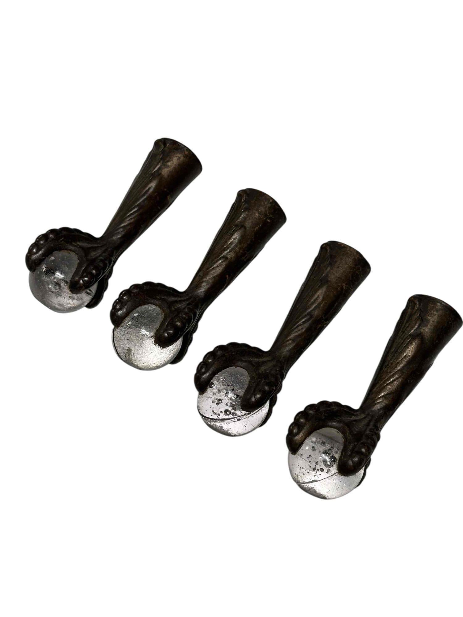 Cast Iron Ball and Claw Furniture Feet (4): Set of four antique classic cast iron glass ball and claw table or furniture feet. Measuring approx.4" tall. In good age appropriate condition, see photos.