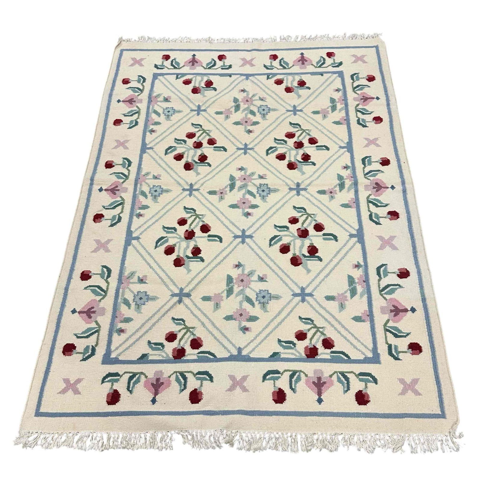 Country Farmhouse Style Throw Area Rug 72" x 50": Country style Ivory/cream wool area rug with floral and cherry decor with blue border and tassels. Measuring approx. 72" long by 50" wide not including tassels. In good condition, see photos.
