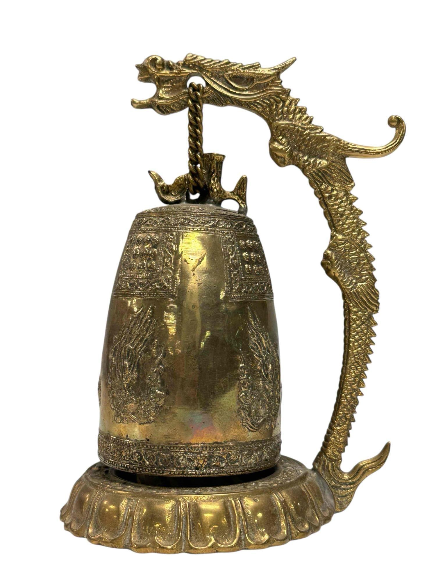 Chinese Brass Temple Gong Bell on Dragon Stand: Vintage Chinese Brass Temple Gong Bell on Dragon Stand suspended by chain. Measuring approx. 8" tall. In good condition, see photos.