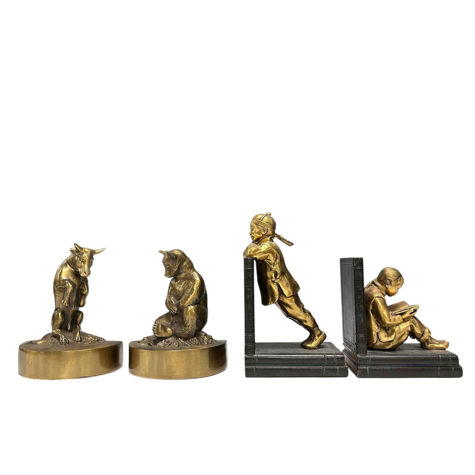 Vintage Children Bull and Bear Vintage Bookends (4): Ronson Art Metal Works metal clad Chinese children scholar bookends circa 1930s. The bookends depict two Chinese youngsters on metal books the boy is patiently observing while the girl is quietly abso