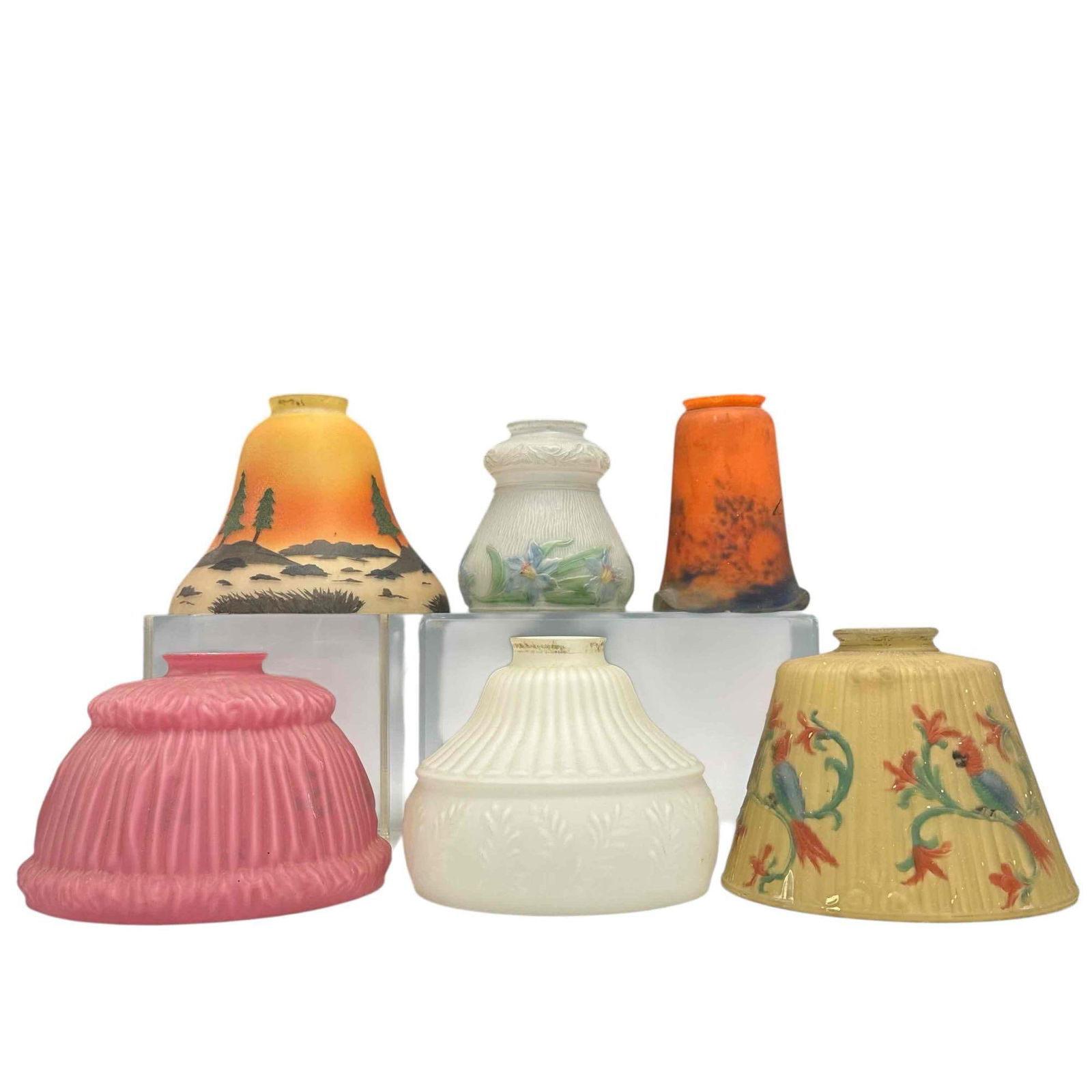 Reverse Painted Art Nouveau and Landscape Lamp Shades (6): Great grouping of unique lamp shades including; Moe Bridges reverse painted parrot shade on golden yellow background 5.5" tall, Victorian pink satin draped reverse painted floral shade 5" tall, revers