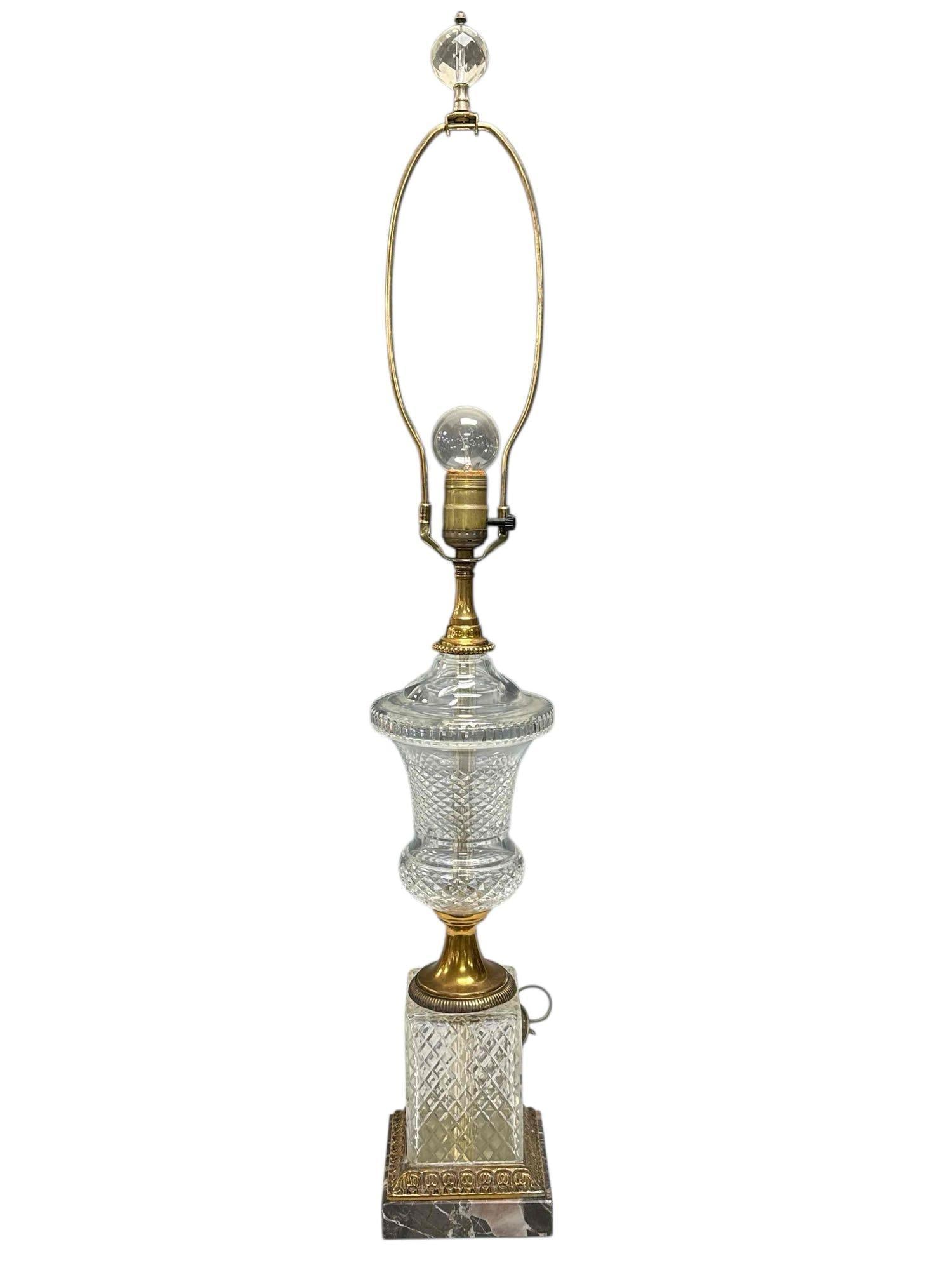 Paul Hanson Crystal Table Lamp with Finial on Marble Base: Mid century Paul Hanson crystal and brass table lamp on square marble base with crystal finial. Measuring approx. 34.5" tall to top of finial. In good age appropriate condition, see photos.