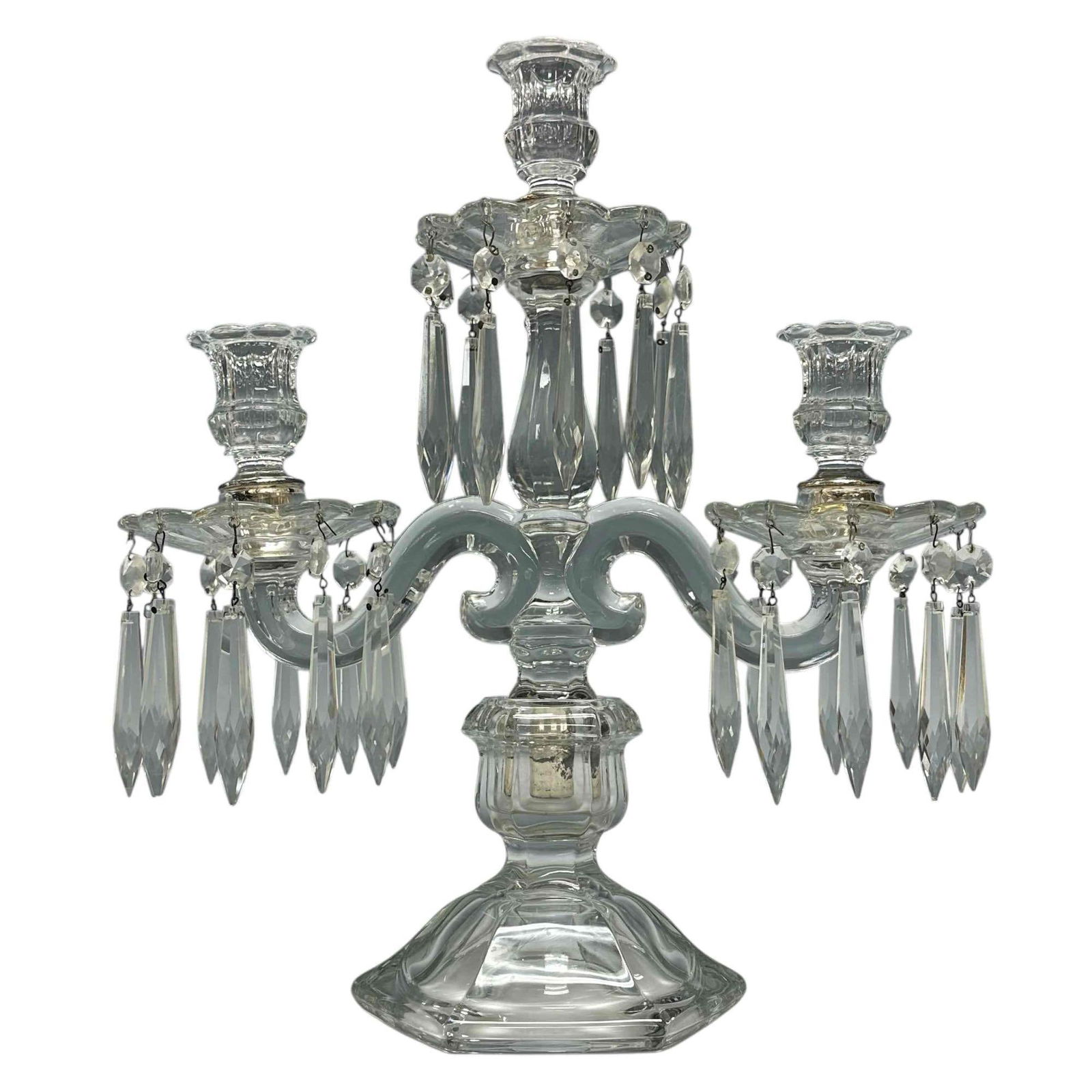 3-Light HEISEY Glass and Crystal Candelabra: Crystal candelabra with two branch arms and taller center candle stick with spear / tear drop double hung prisms. Adjustable arms and breaks down measuring approx 15" tall x 13" wide. Light dust soil,