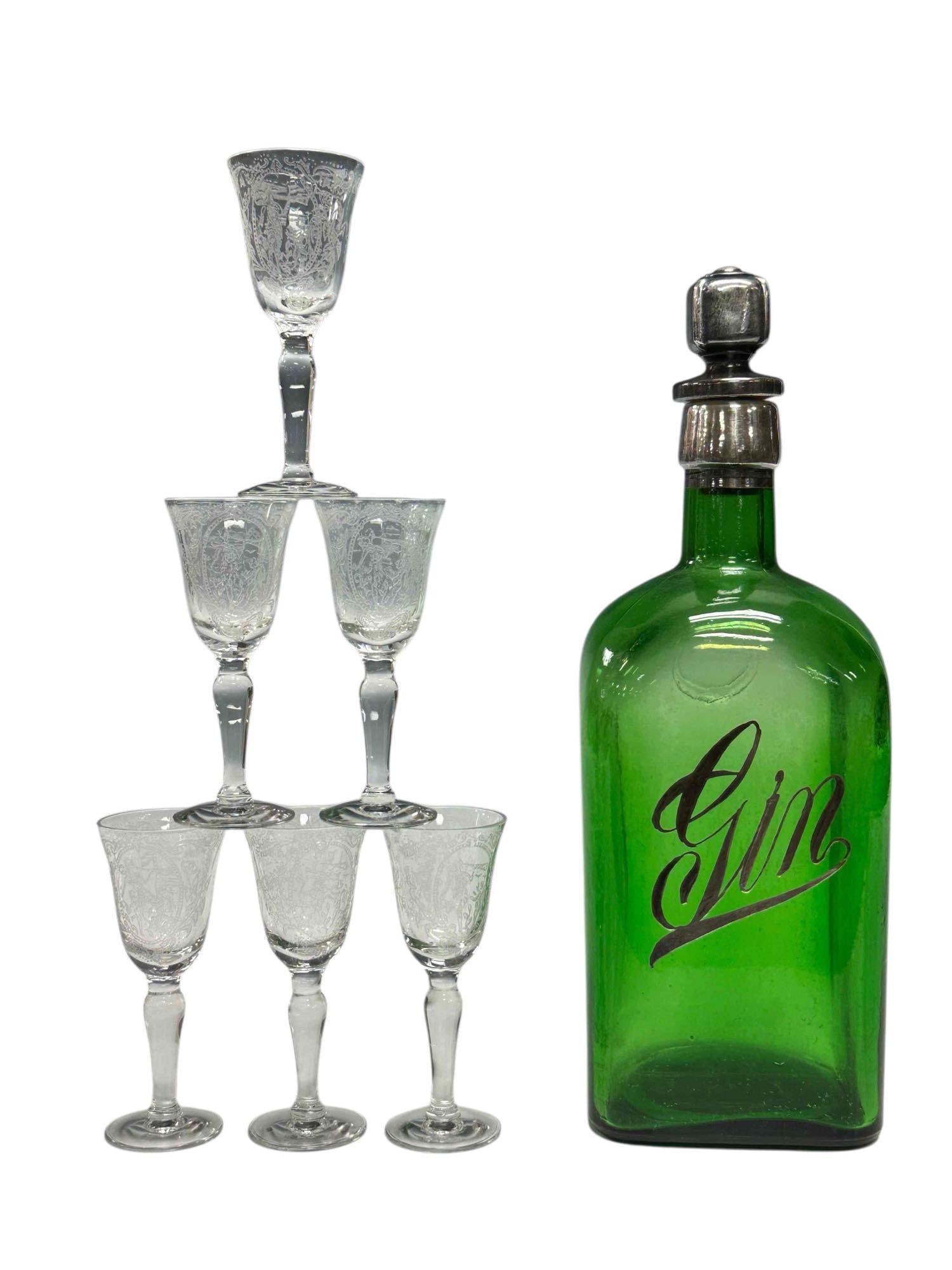 Tiffin-Franciscan Etched Crystal Cordials with Green Glass Gin Decanter: Set of six Tiffin-Franciscan etched crystal cordials 3.75" tall accompanied with vintage silver overlay green glass "Gin" decanter with stopper likely A.M. Bininger & Co. 10" tall. In good conditi