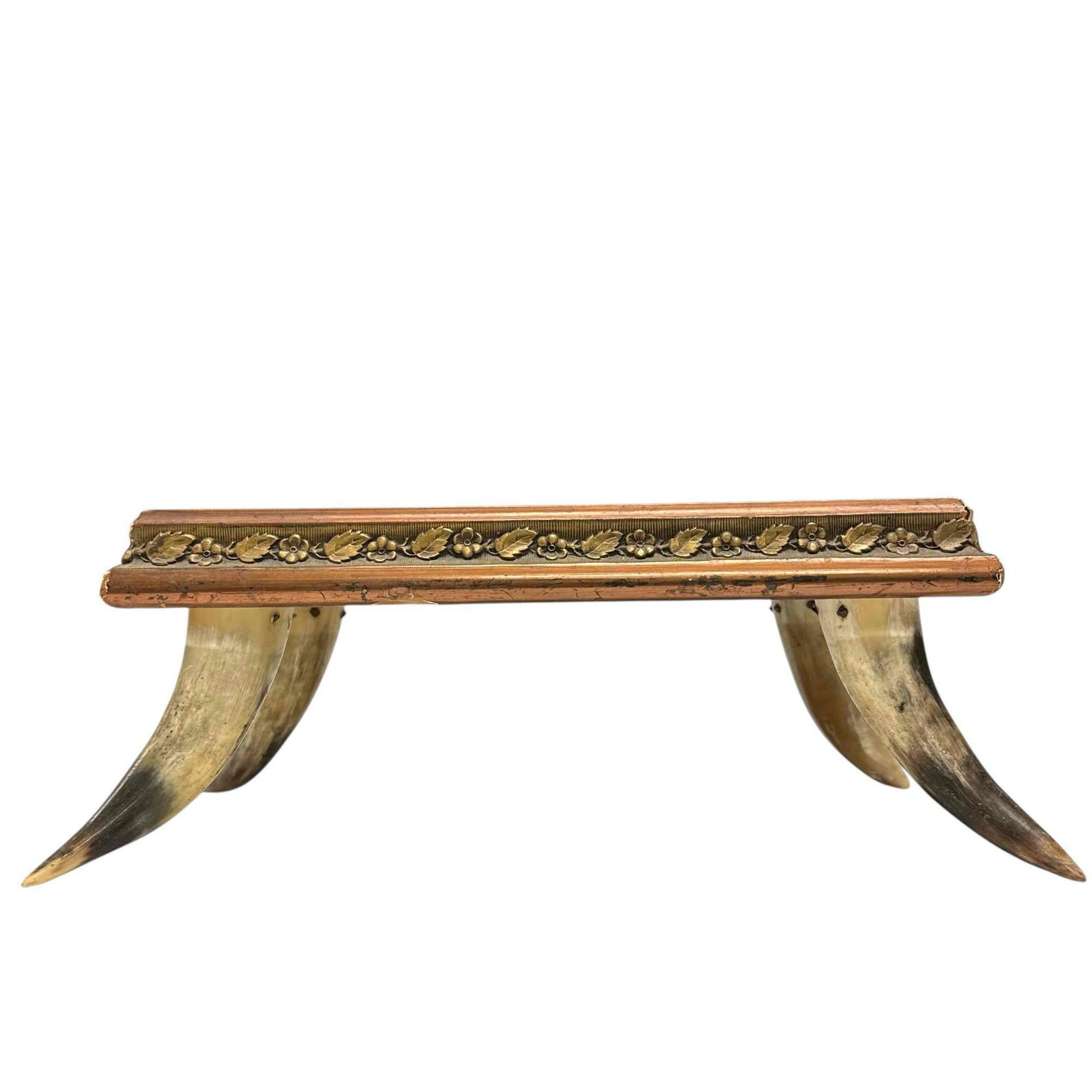 Victorian Era Western Folk Art Horn Leg Footstool: Western folk art Victorian period horn leg footstool. Copper gilt or gessoed overlay frame with intertwining flowers and leaves pattern. Will need new cushion or top, could be converted to a table top